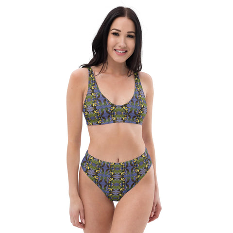 Woman wearing colorful blue tropical recycled polyester bird bikini with handpainted design by Anke Wonder.