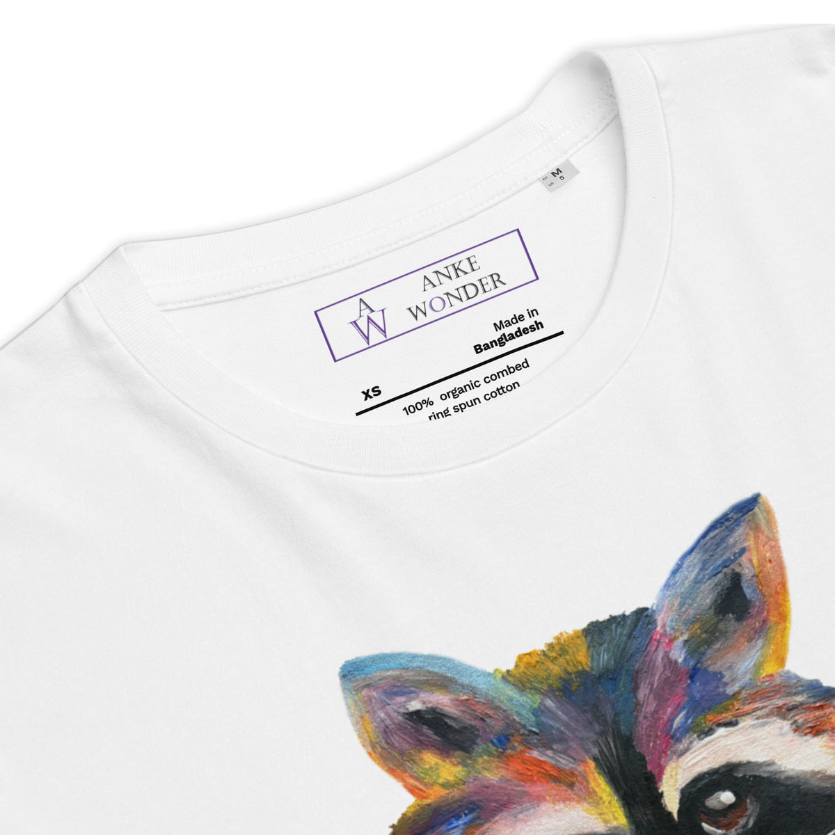 Close-up of a white short-sleeve t-shirt showing the inner neck label with 'ANKE WONDER' and a colorful painted fox graphic at the bottom right.