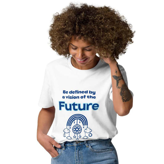 A Black woman wearing a white organic cotton t-shirt tucked into high-waisted blue jeans, standing confidently. The t-shirt features a light blue futuristic dream catcher design and inspiring quote 'Be definied by a vision of the future'.