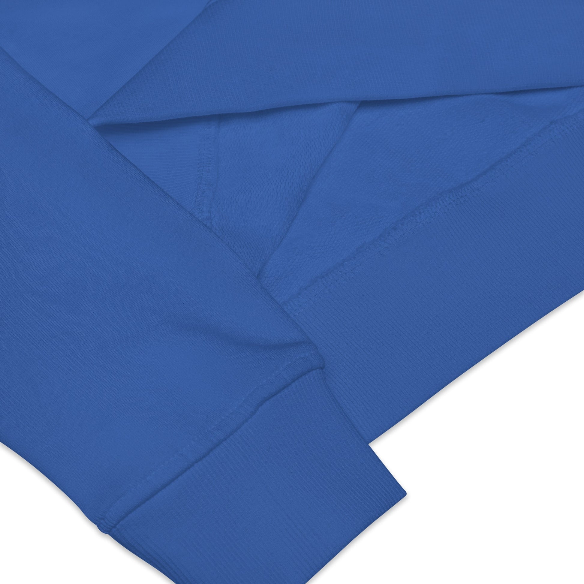 Close-up of sleeves of blue sweatshirt with a white background
