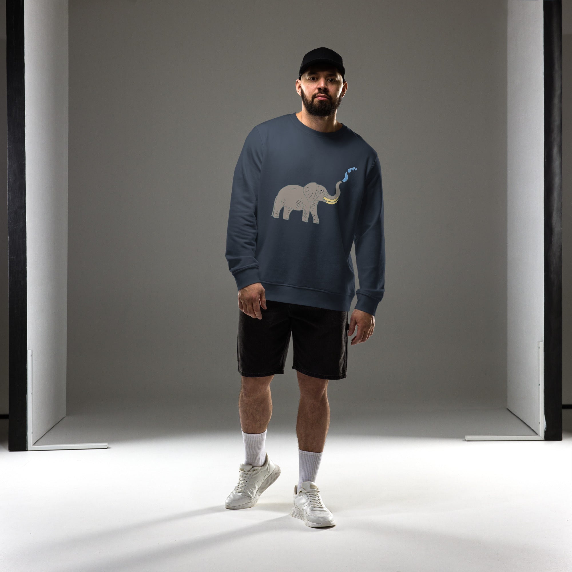 Front view of men's navy sweatshirt showcasing the minimalist elephant design on the left chest with a simple, sketch-like style.