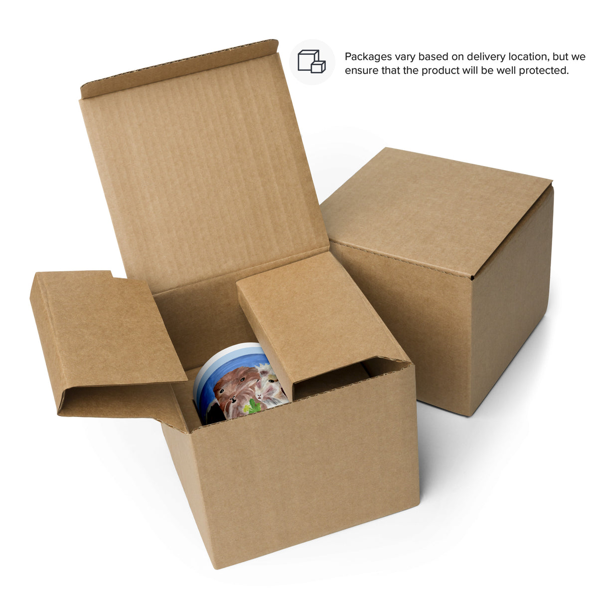 Open cardboard box with a colorful mug inside on a white background