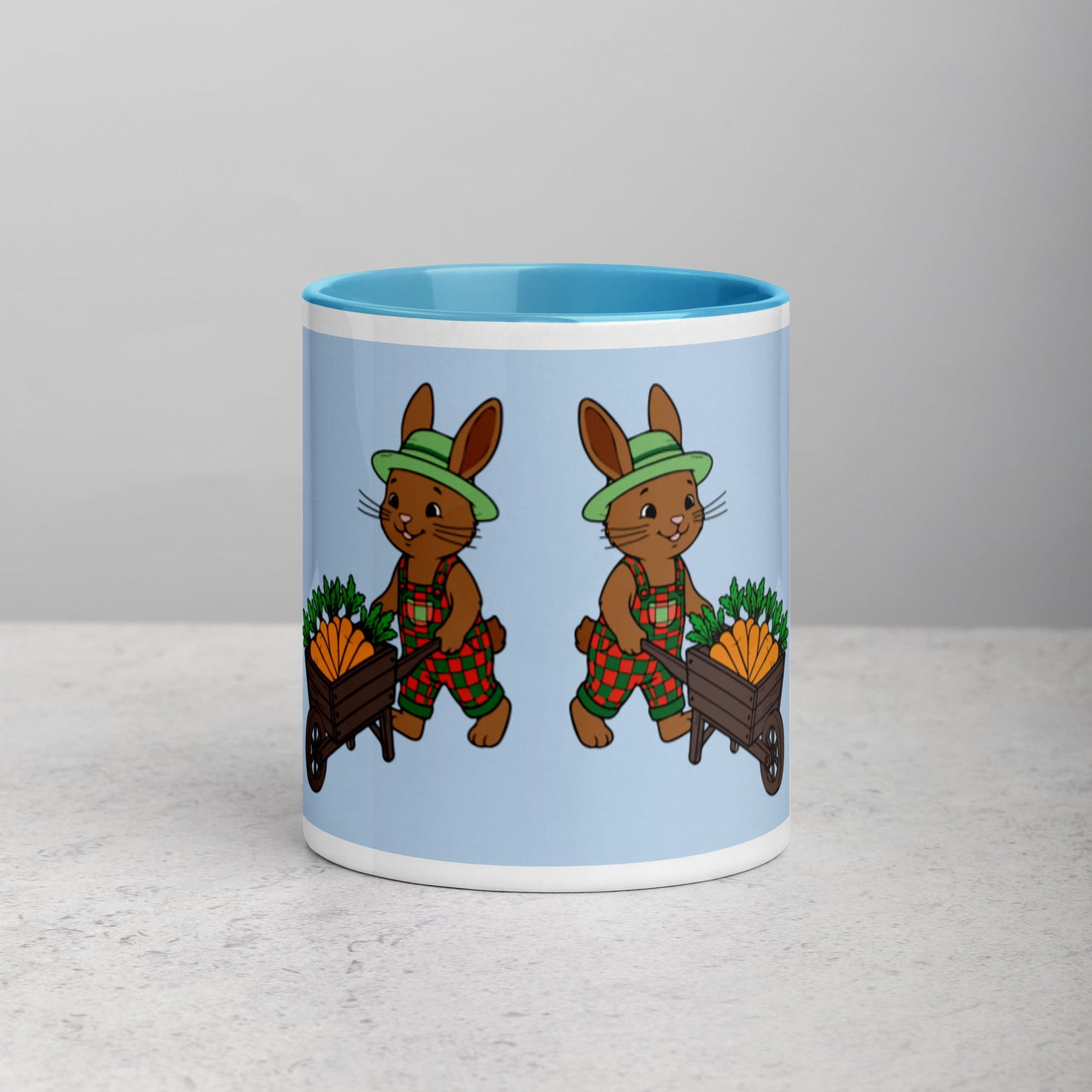 Mug with cartoon bunnies design on a light gray background