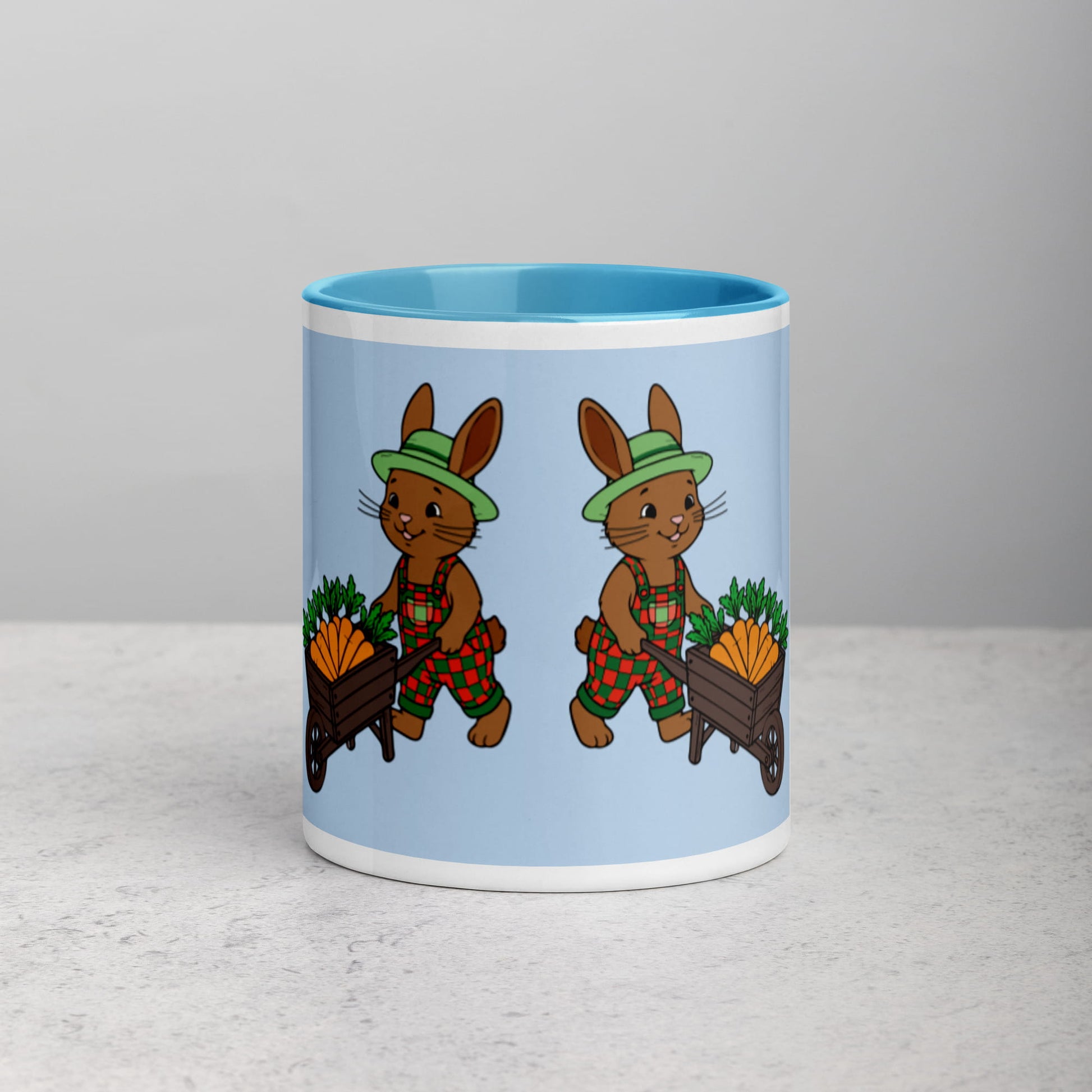 Mug with cartoon bunnies design on a light gray background