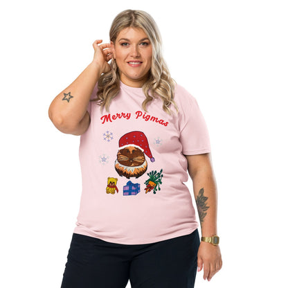 Woman wearing a pink t-shirt with Christmas-themed graphics and text 'Merry Pigmas' on a white background