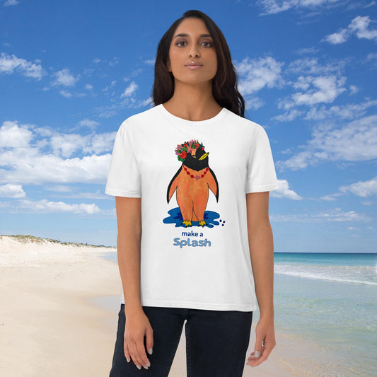 Woman wearing a white t-shirt with a cartoon penguin design and the words 'Make a splash'.