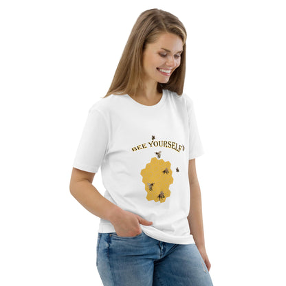 Woman wearing a white t-shirt with a graphic design of a beecomb and the text 'Bee Yourself' on a white background