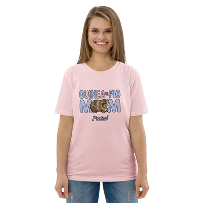 Woman wearing a pink t-shirt with 'Guinea Pig Mom' text and graphic on a white background