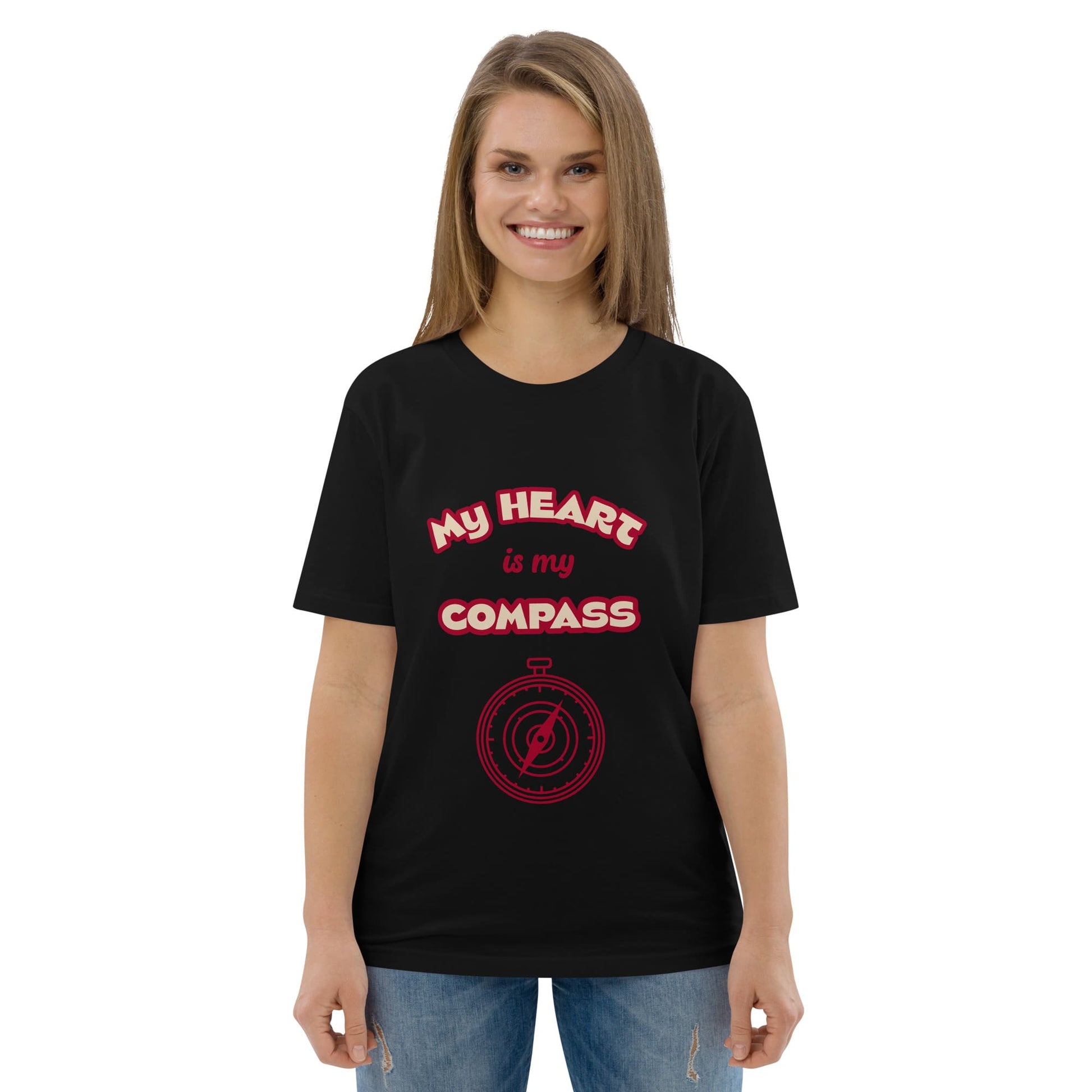 Women’s black sustainable cotton t-shirt featuring red compass and ‘My Heart is My Compass’ message — ethical fashion with spiritual soul.
