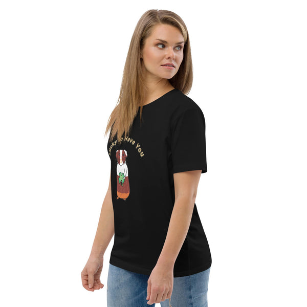 Side view of a woman wearing a black organic cotton t-shirt, showing the guinea pig and shamrock design with "Lucky to Have You" text above.