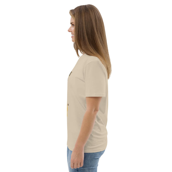 Side view of a woman wearing a desert dust Queen Bee Mom organic cotton t-shirt, showcasing the relaxed fit and soft texture.