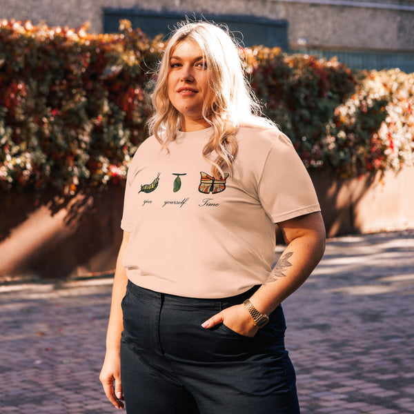 Plus Model wearing a Fraiche-Peche organic cotton t-shirt featuring a butterfly design by Anke Wonder.