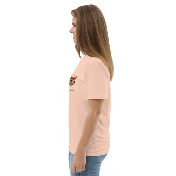 Side profile of a model wearing the Fraiche-Peche butterfly t-shirt, showcasing soft organic cotton and a flattering fit.