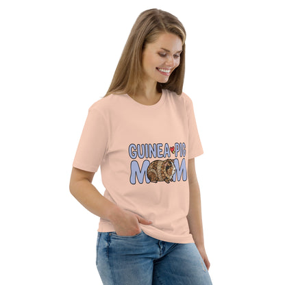 Woman wearing a peach t-shirt with 'Guinea Pig Mom' text and graphic on a white background