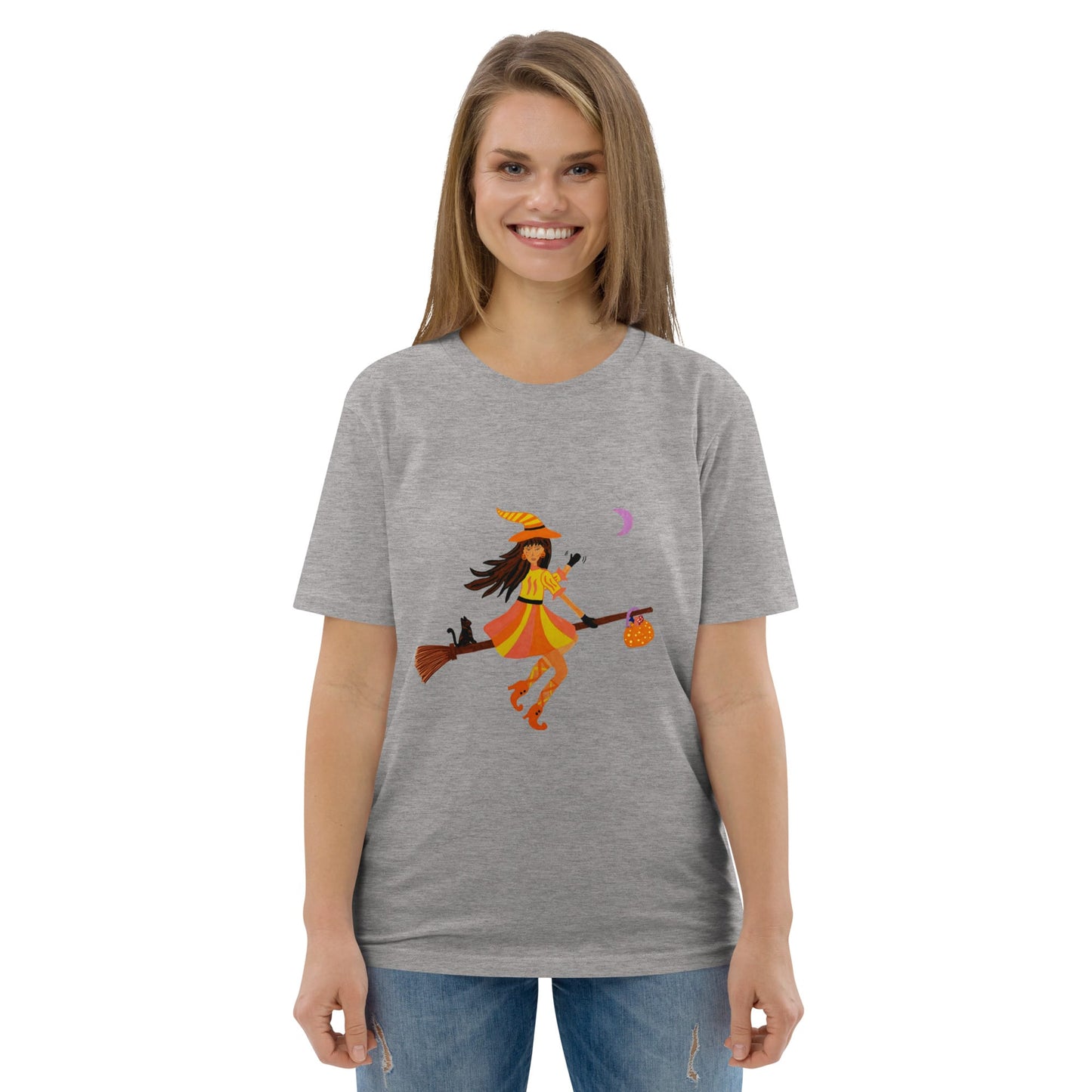 Woman wearing a gray t-shirt with a colorful Halloween Witch design on a white background