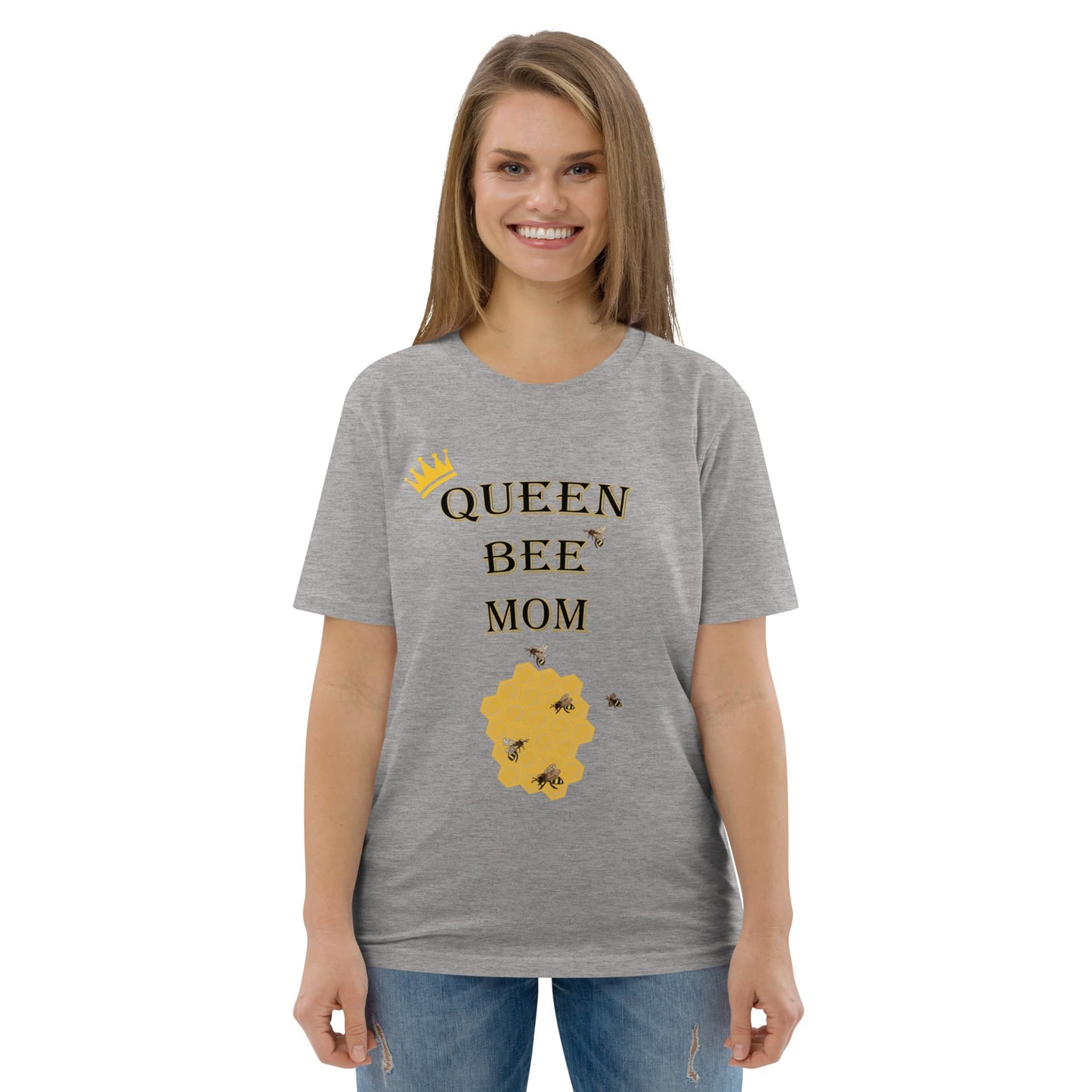 Woman wearing heather grey Queen Bee Mom organic cotton t-shirt, smiling, front view.