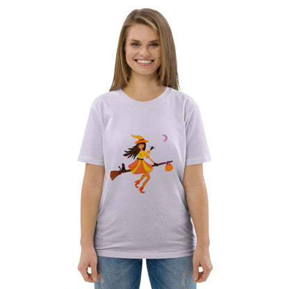 Woman wearing a white t-shirt with a graphic design of a witch on a broomstick.