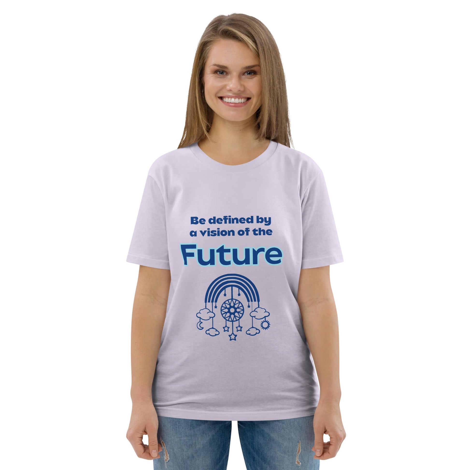 Woman wearing an organic cotton t-shirt in lavender with “Be defined by a vision of the Future” design featuring a dream catcher with rainbow, stars, and clouds.