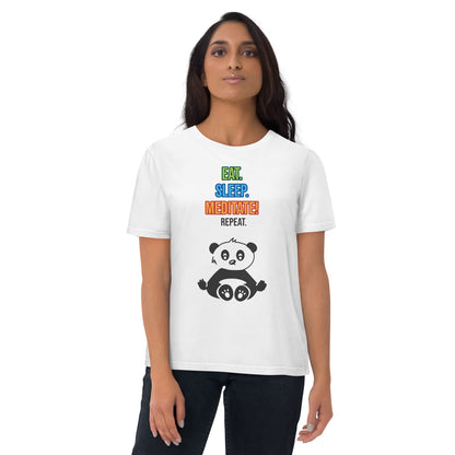 Woman wearing a white organic cotton that features a colorful "Eat. Sleep. Meditate! Repeat." text and a cute panda illustration by Anke Wonder.