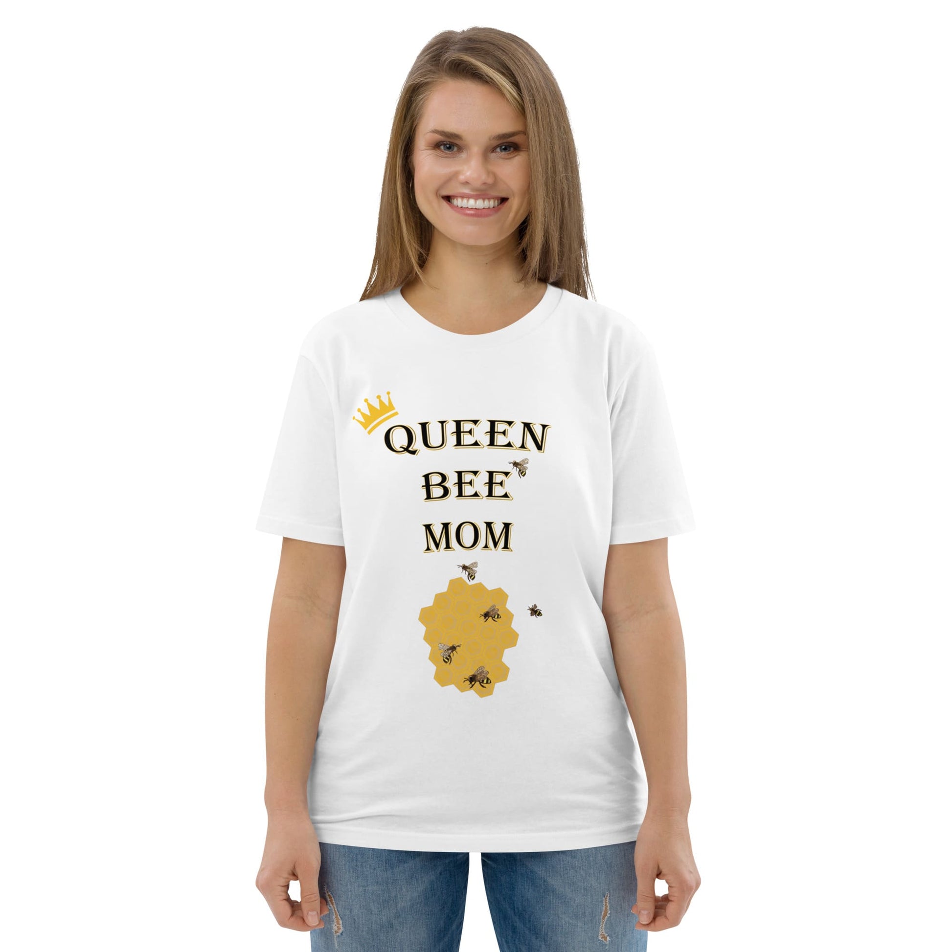 Woman wearing white Queen Bee Mom organic cotton t-shirt, smiling, front view.