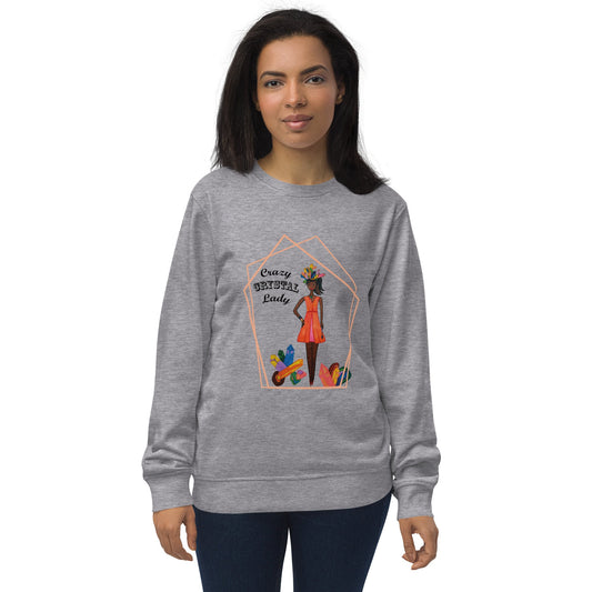 Woman wearing a gray sweatshirt with a colorful graphic design of a black woman with the words 'Crazy Crystal Lady' on a white background