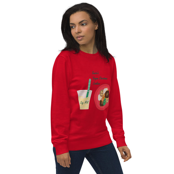 Front left angled view of a women's organic cotton Christmas sweatshirt in red, showcasing the cozy fit and holiday design 'Vegan Christmas Cookies'.