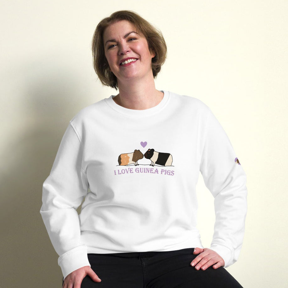 Plus-size model wearing a white "I Love Guinea Pigs" organic cotton sweatshirt, showcasing the adorable guinea pig design.