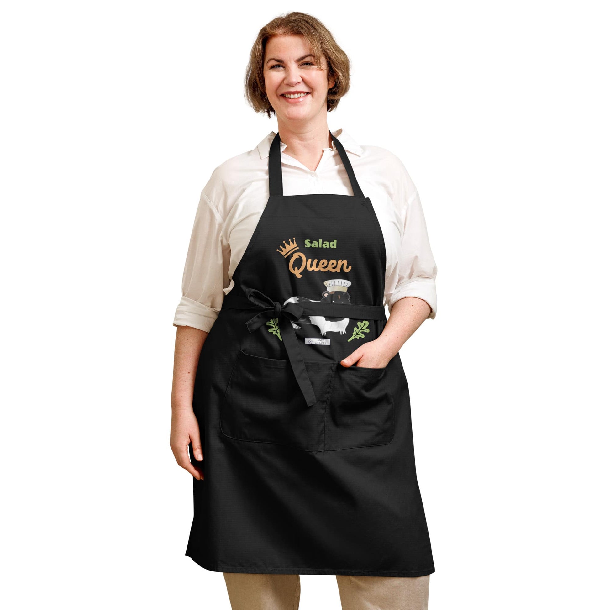 A plus-size woman wears a black Salad Queen apron, showcasing a cute guinea pig with a chef’s hat.