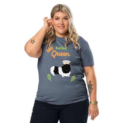 Plus-size woman wearing a organic cotton t-shirt in heather blue with “Salad Queen” design featuring a black-and-white guinea pig wearing a chef’s hat, surrounded by lettuce leaves.
