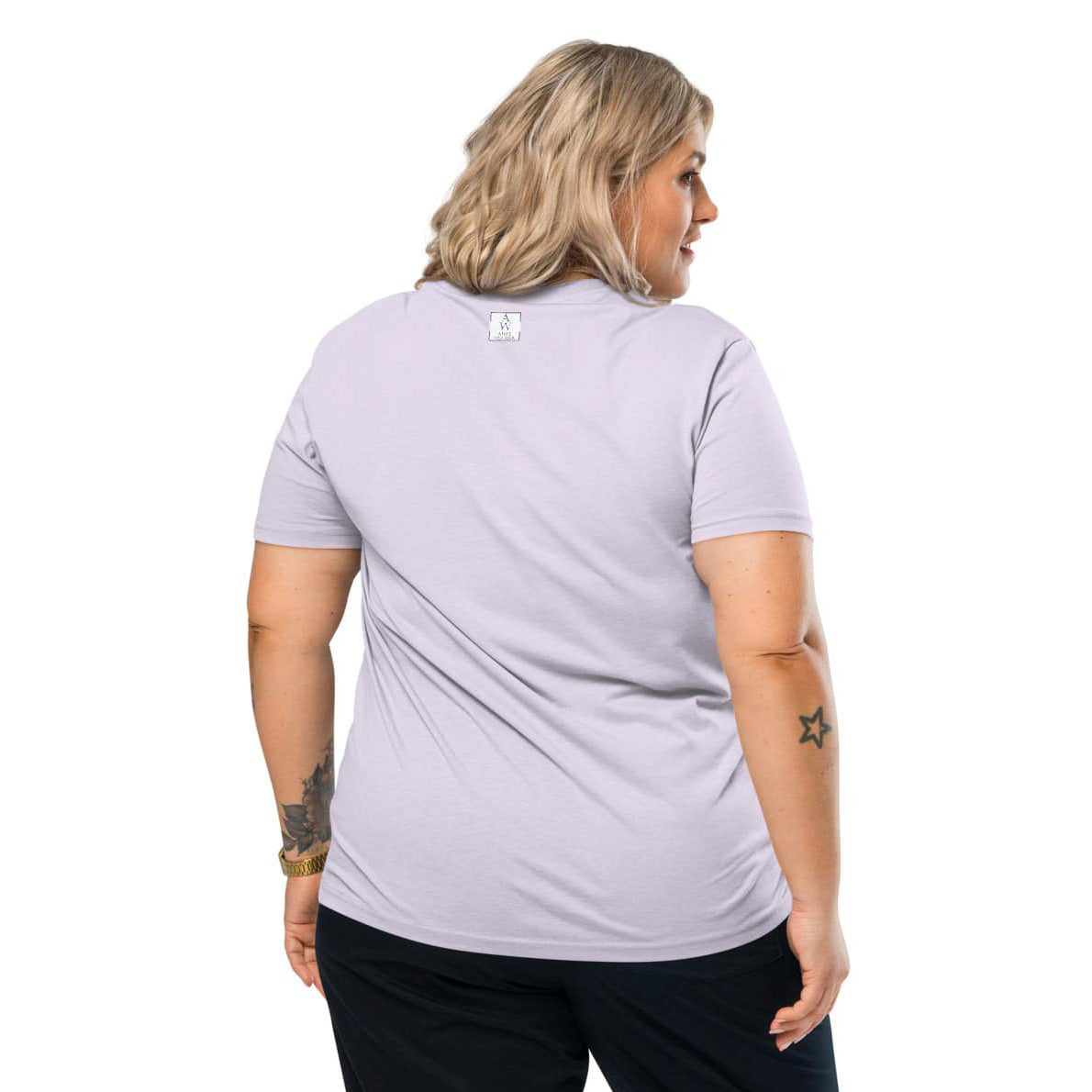 Back view of woman wearing a light purple t-shirt with the Anke Wonder logo on a white background