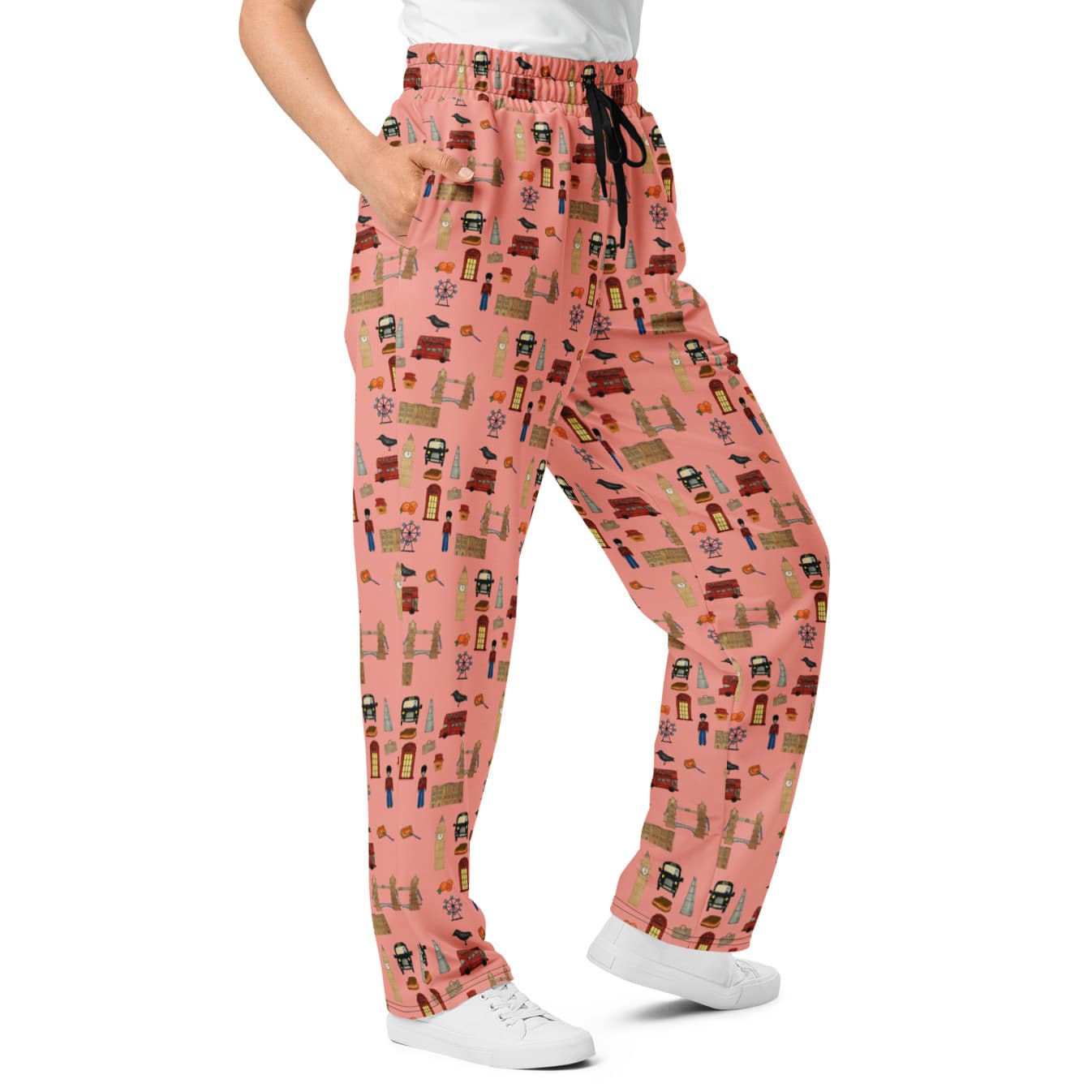 Close-up of right side of women's pink London-themed joggers showing side pocket and drawstring waistband by Anke Wonder.