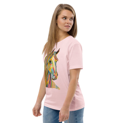 A woman modeling a light pink short-sleeve t-shirt with a colorful watercolor-style horse graphic on the front, paired with blue jeans against a plain white background.