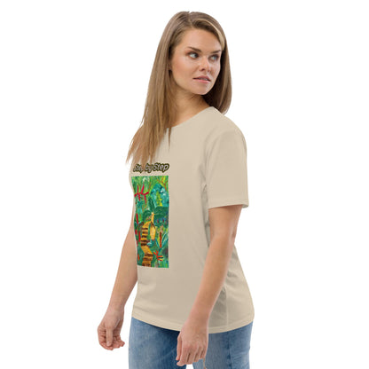 Woman wearing a beige t-shirt with a colorful artwork of greenery on a white background