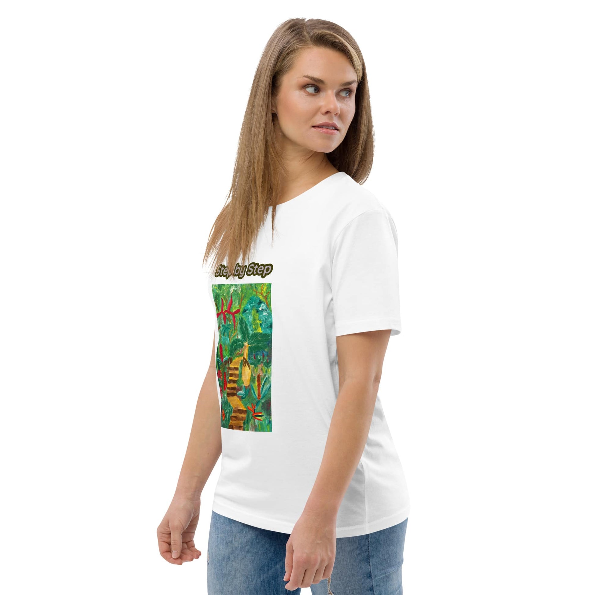 Woman wearing a white t-shirt with colorful artwork on a white background