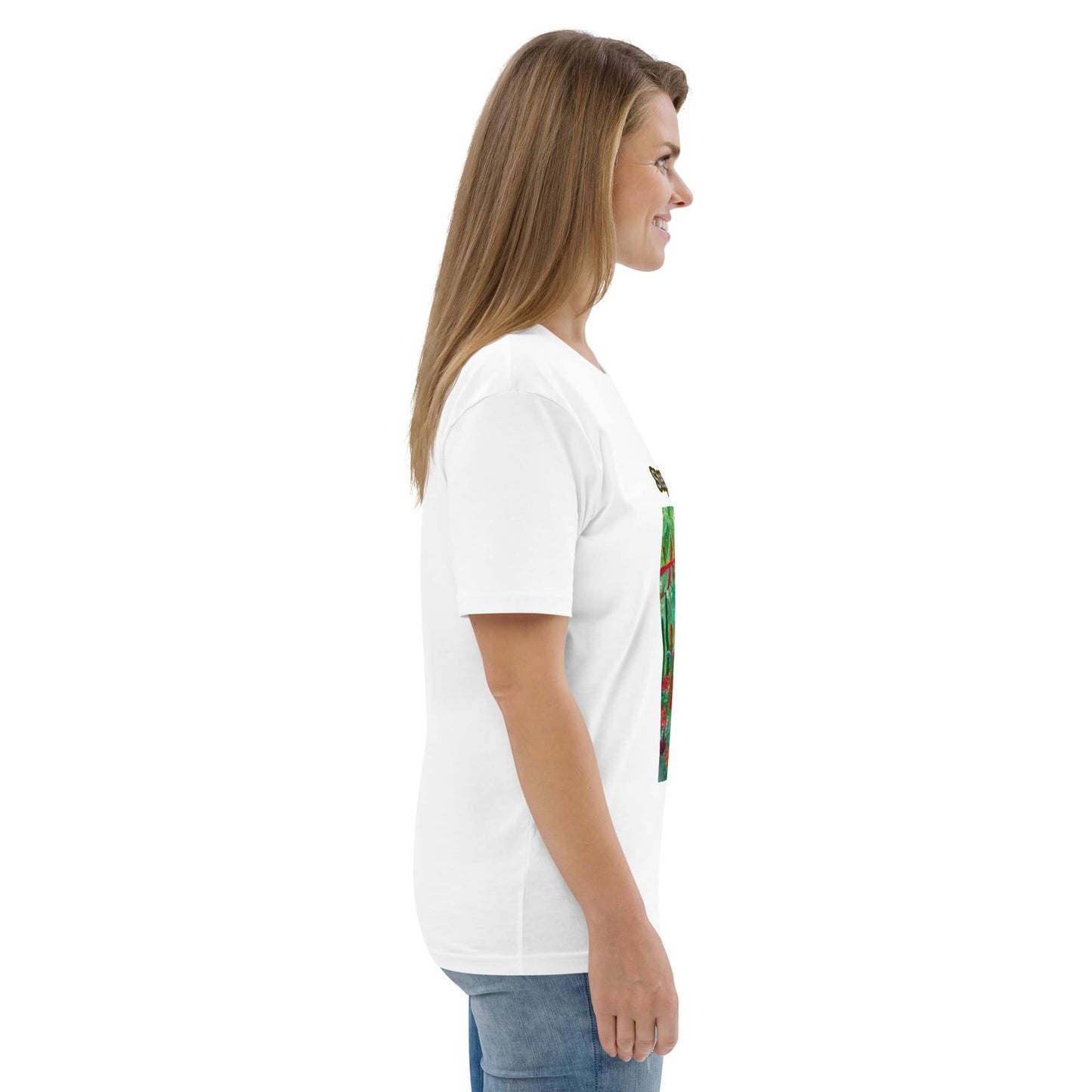 Side view of woman wearing a white t-shirt with a tropical design on a white background