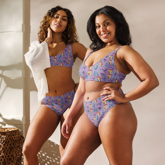 Two models, one plus-size and one standard size, wearing the same high-waisted mushroom-print bikini on a sunny beach, highlighting body inclusivity and eco-friendly fashion.