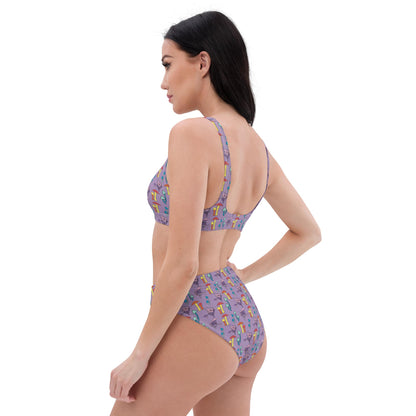 A side-profile shot of a woman modeling a purple mushroom-print bikini, emphasizing the double-layered, eco-conscious fabric and flattering high-rise design.