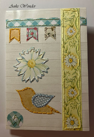 Hand-Embroidered floral greeting card with a bird application for gifting.